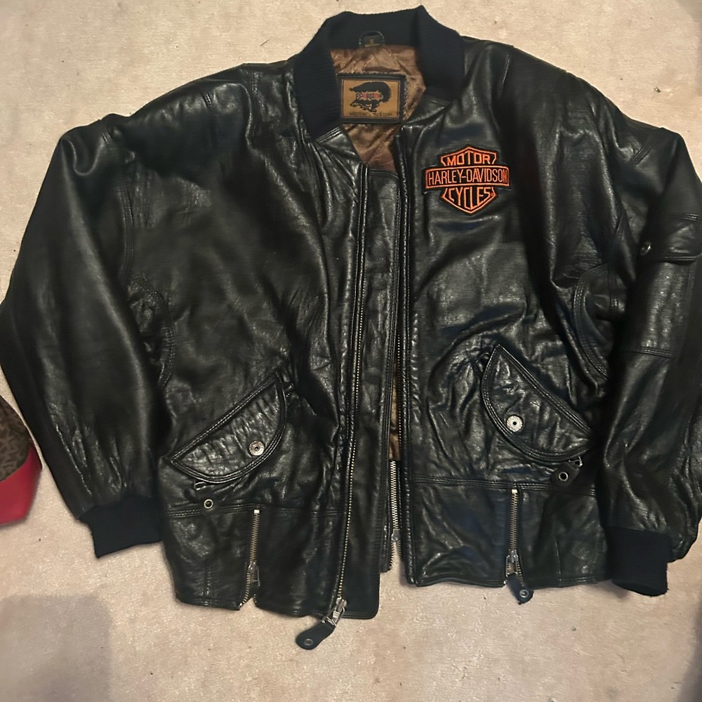 Fox run leather jacket with Harley-Davidson patch. Vintage Black Bomber style